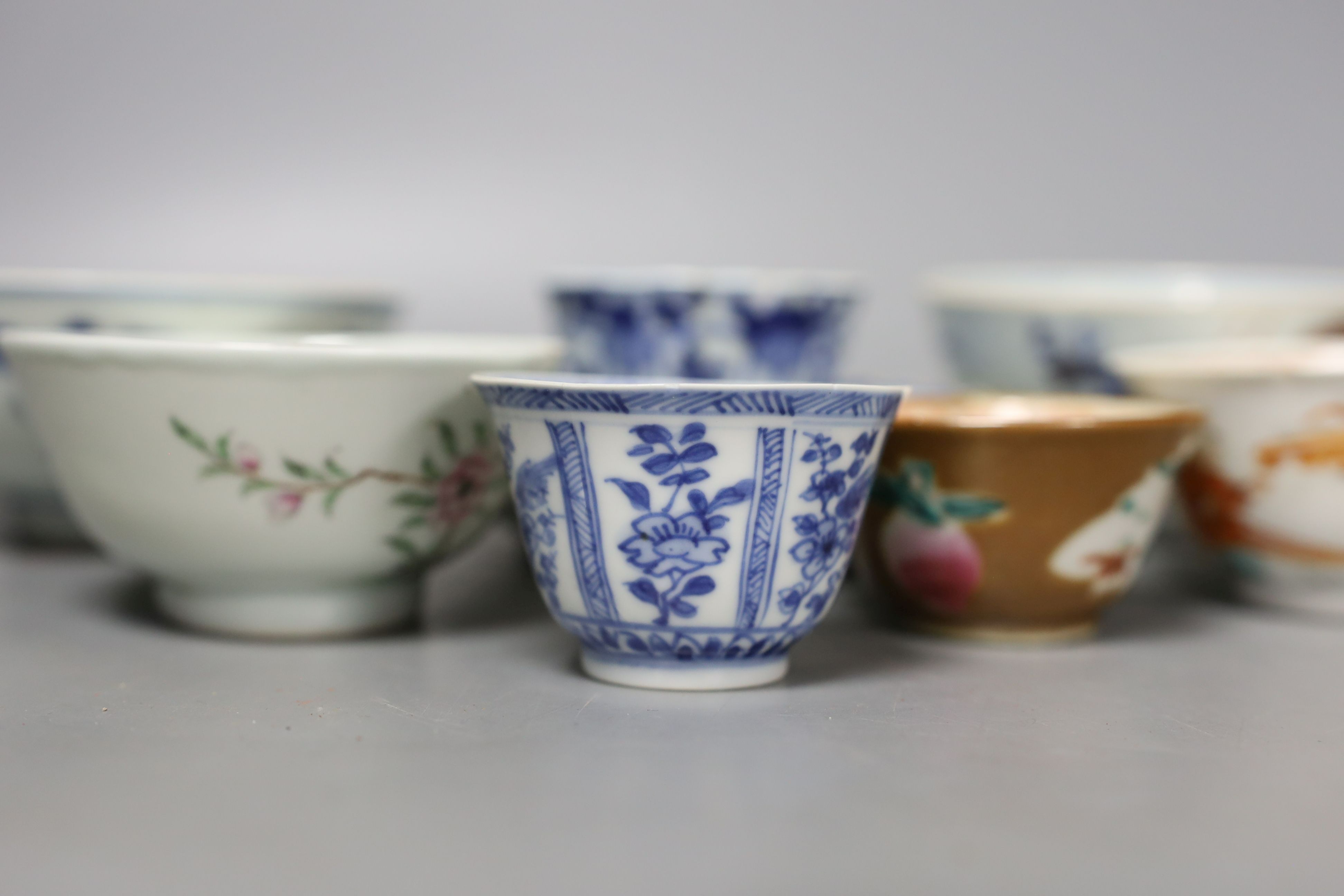 A collection of seven various 18th century and later Chinese tea and rice bowls and two saucers, a single large saucer (10)